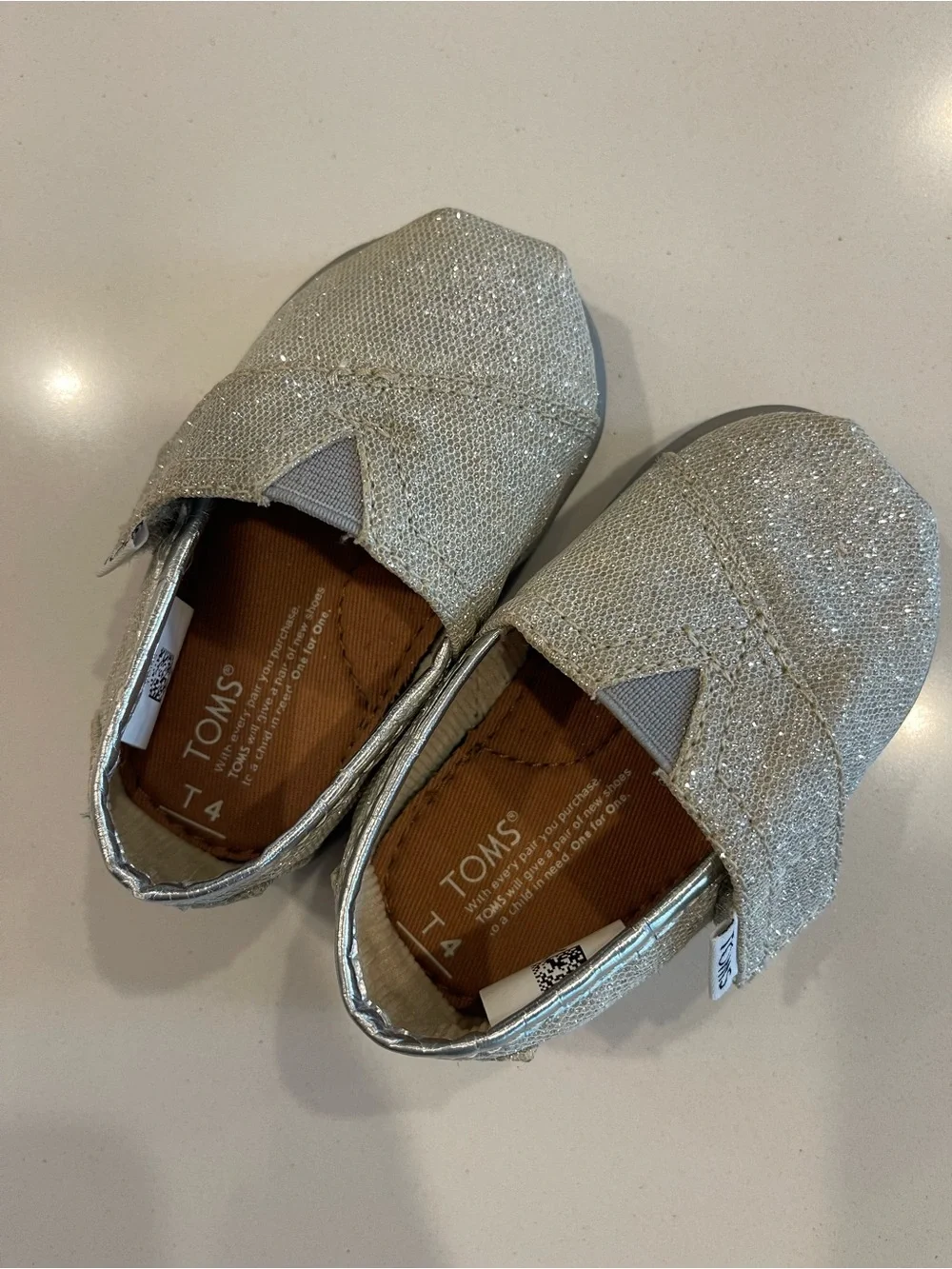 TOMS silver glitter classic Toddler shoe size T4
